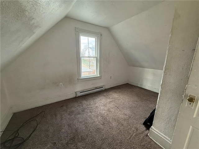 bonus room featuring carpet flooring, lofted ceiling, baseboard heating, and a textured ceiling