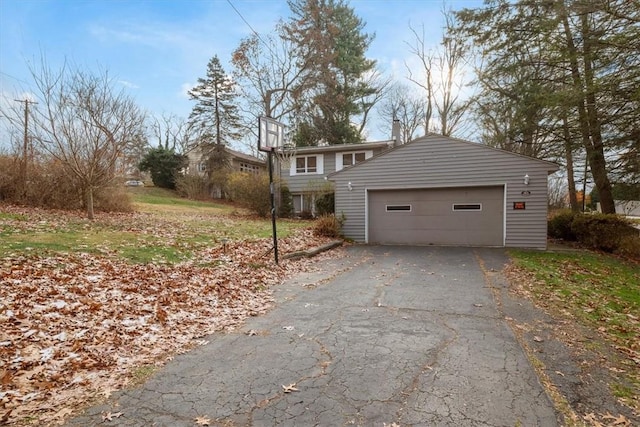 view of home's exterior featuring a garage