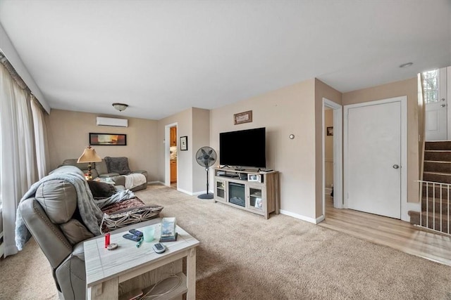 living room featuring light colored carpet and an AC wall unit