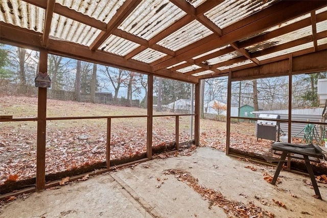 unfurnished sunroom with a wealth of natural light