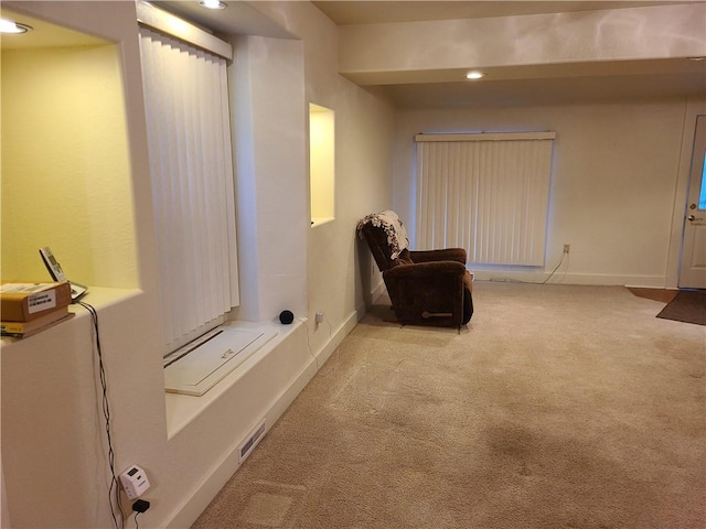 sitting room with light carpet