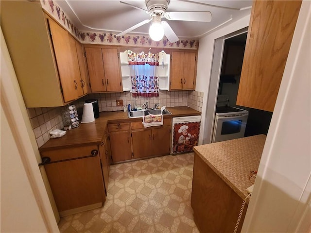 kitchen with ceiling fan, white electric range, and tasteful backsplash