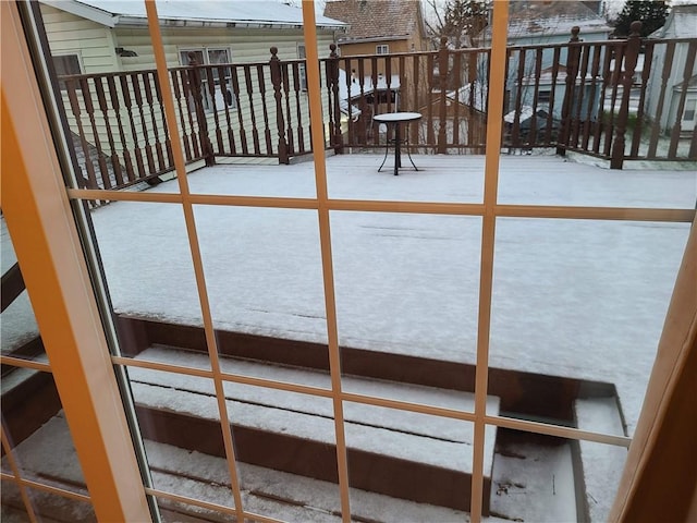 view of snow covered deck