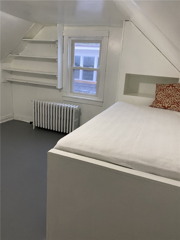 bedroom with radiator heating unit