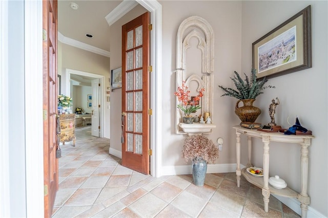 doorway to outside with french doors and ornamental molding