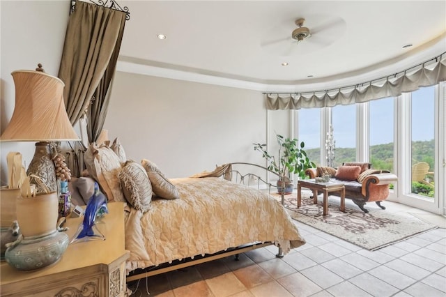 tiled bedroom with recessed lighting and a ceiling fan