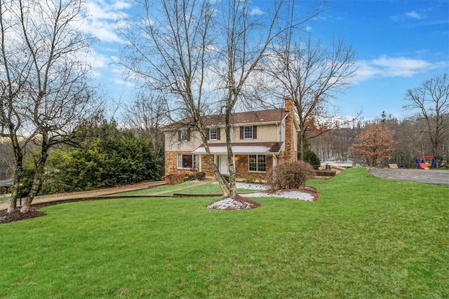 view of front of property with a front lawn