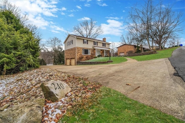 view of home's exterior with a yard and a garage