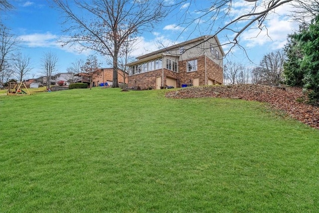 view of yard featuring a garage