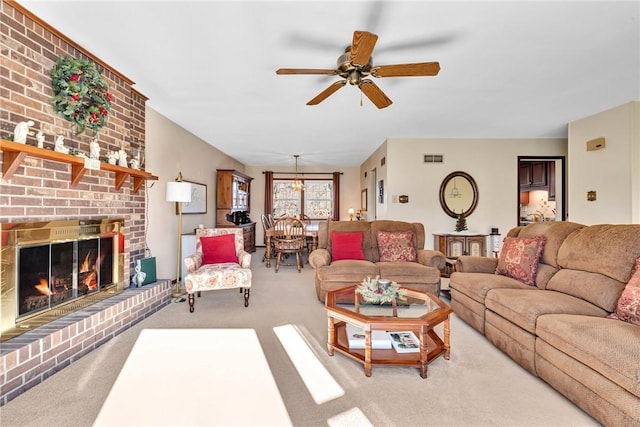 carpeted living room featuring ceiling fan and a brick fireplace