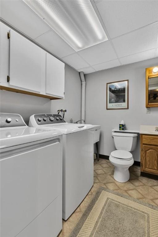 laundry room featuring washer and dryer and sink