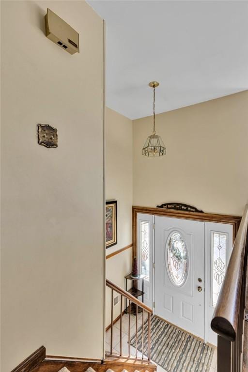 entrance foyer featuring plenty of natural light