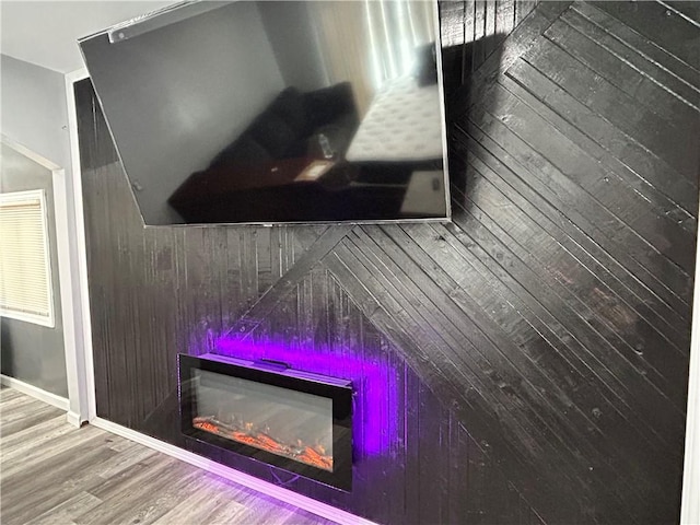 4430 Bowes Ave, West Mifflin, PA 15122 - detailed view of wood finished floors and a glass covered fireplace