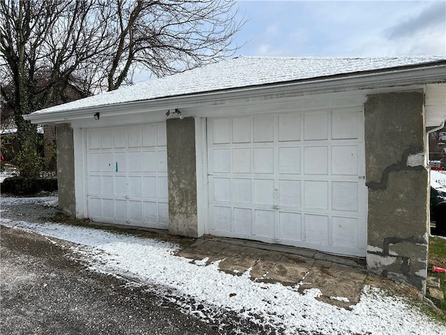 view of snow covered garage