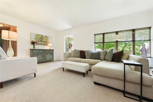 living area with light carpet