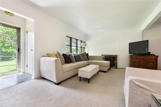 carpeted living room featuring a healthy amount of sunlight