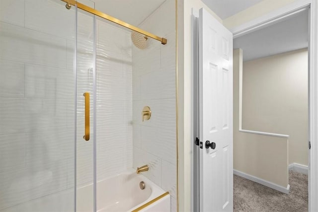 bathroom featuring tiled shower / bath