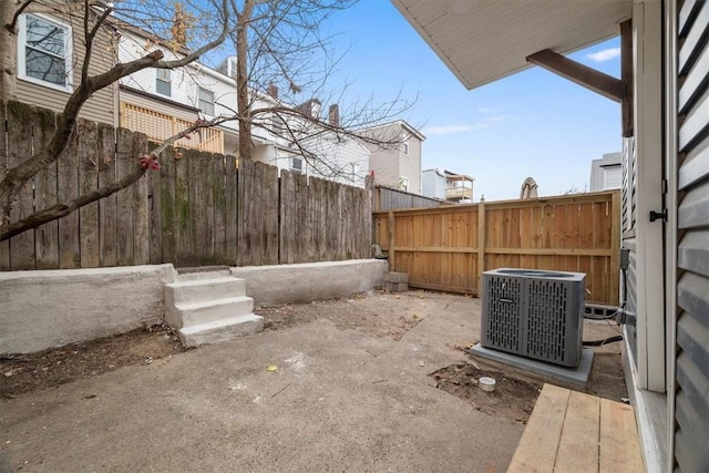 view of patio featuring central AC unit