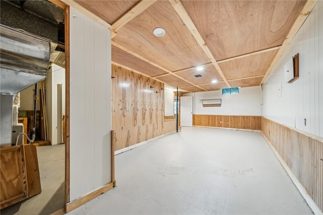 basement with wooden walls