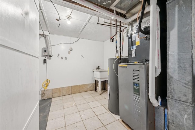 utility room with electric water heater