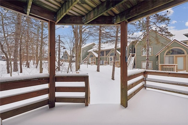 view of snow covered deck