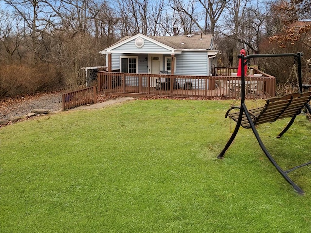 view of yard featuring a deck