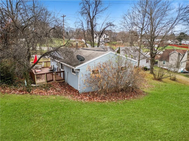 exterior space featuring a yard and a deck