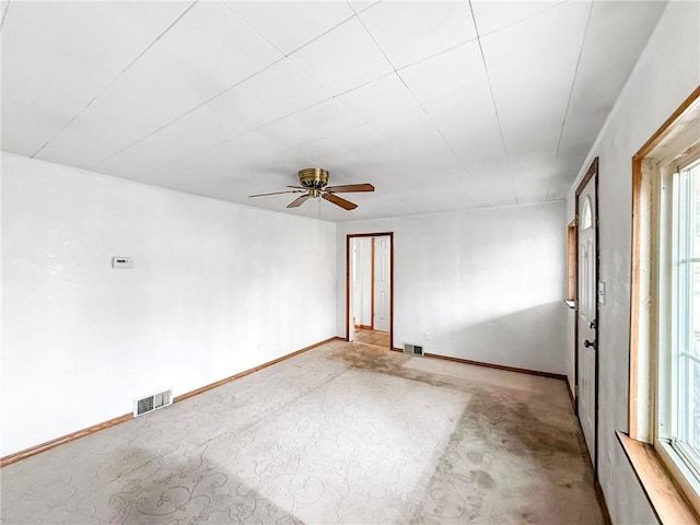 empty room featuring ceiling fan