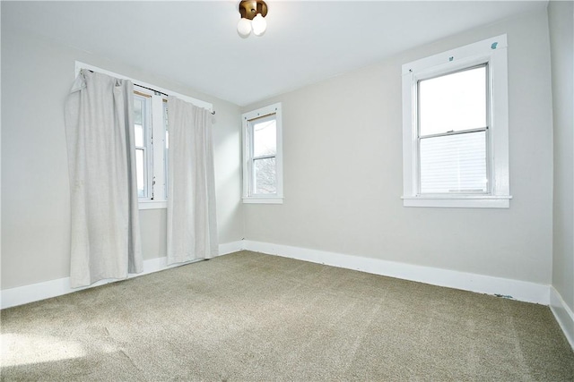 empty room featuring carpet flooring