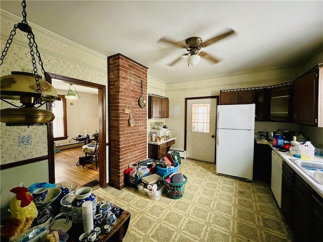 kitchen featuring dark brown cabinets, light hardwood / wood-style flooring, white appliances, and ornamental molding