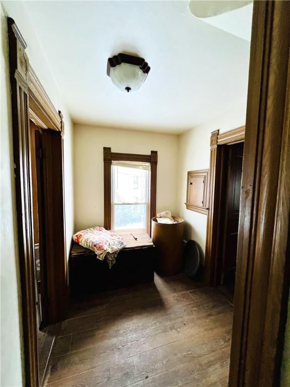 interior space with dark hardwood / wood-style flooring