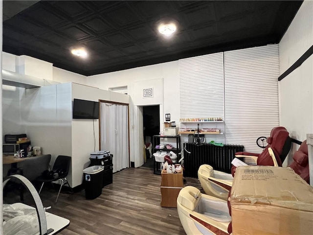office space with dark wood finished floors and an ornate ceiling