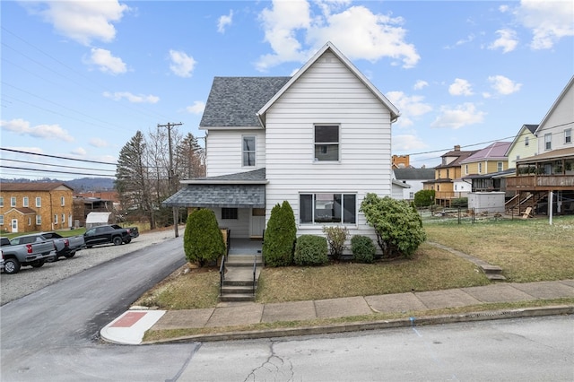 view of front of property with a front lawn