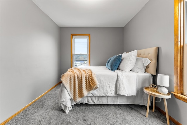 bedroom featuring carpet