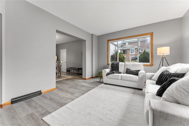 living room with light hardwood / wood-style floors