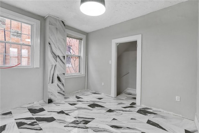 bedroom featuring a textured ceiling