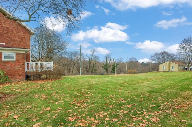 view of yard featuring a deck