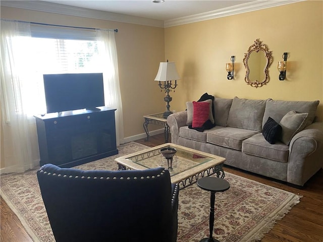 living room with dark hardwood / wood-style flooring and ornamental molding