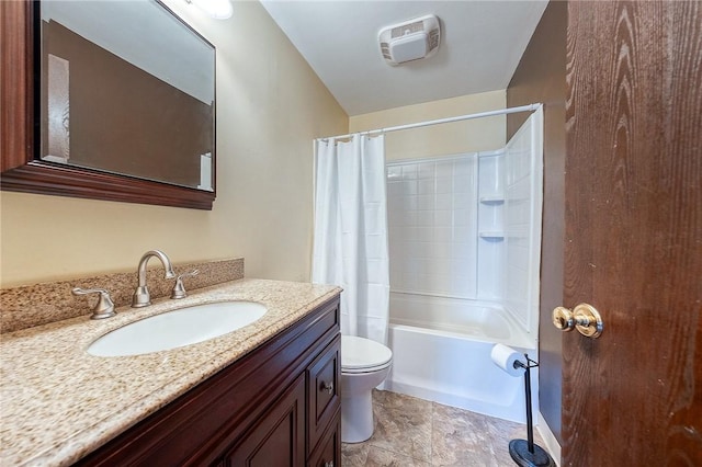 full bathroom featuring vanity, shower / tub combo, and toilet