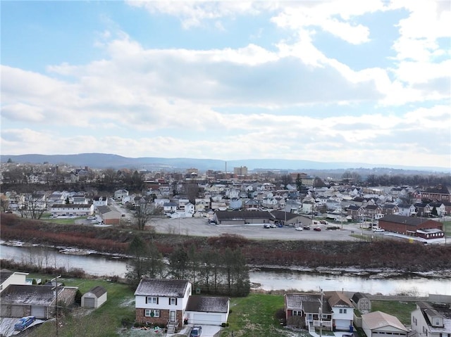 aerial view with a water and mountain view