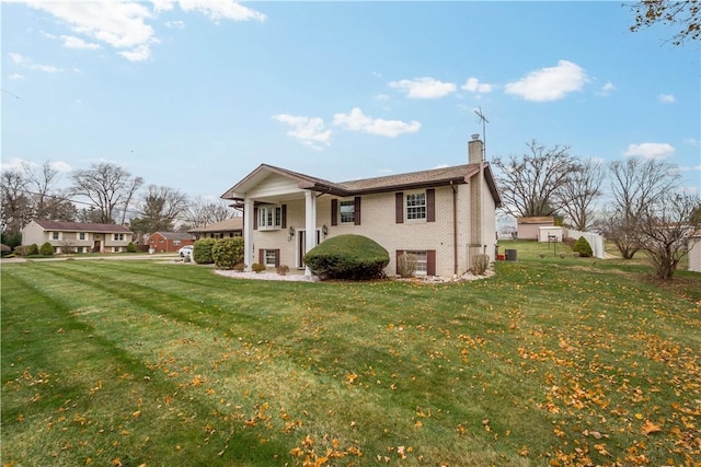 view of side of home featuring a yard