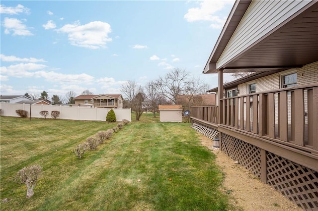 view of yard featuring a wooden deck