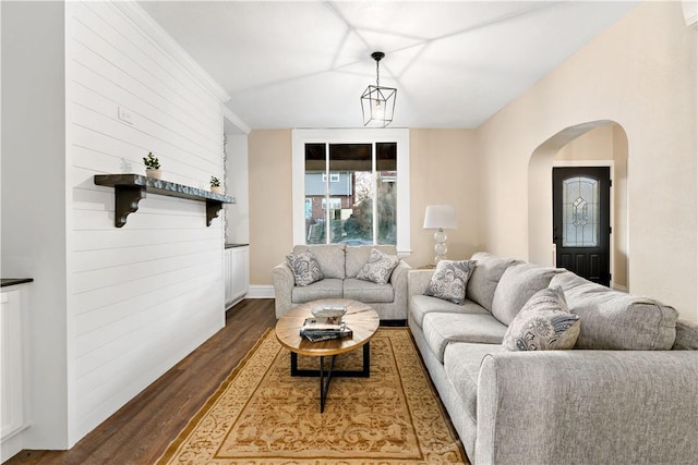 living room with dark hardwood / wood-style floors