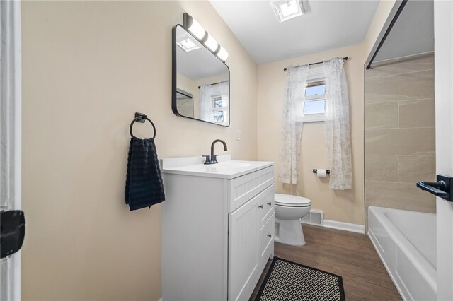 727 Scenery Dr, Elizabeth Twp/Boro, PA 15037 - bathroom featuring vanity, wood finished floors, and  shower combination