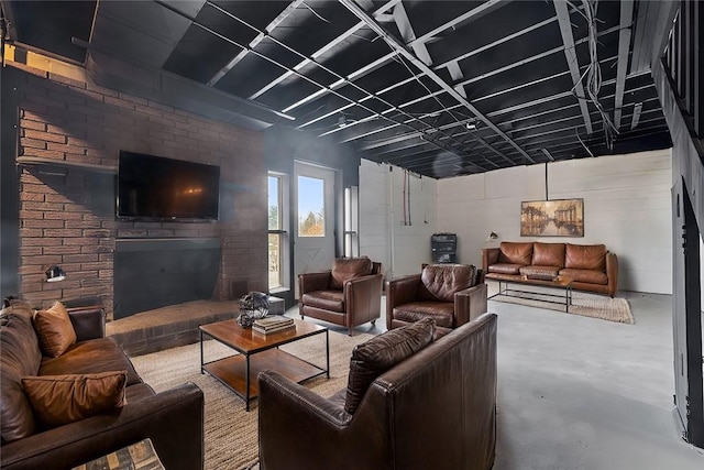 727 Scenery Dr, Elizabeth Twp/Boro, PA 15037 - living area with concrete flooring and a brick fireplace