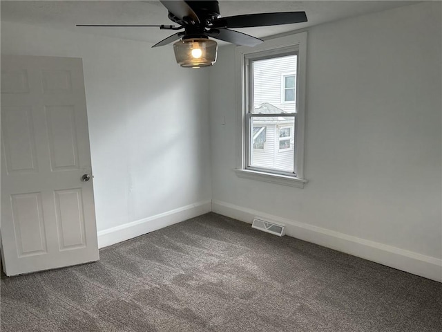 carpeted empty room with ceiling fan