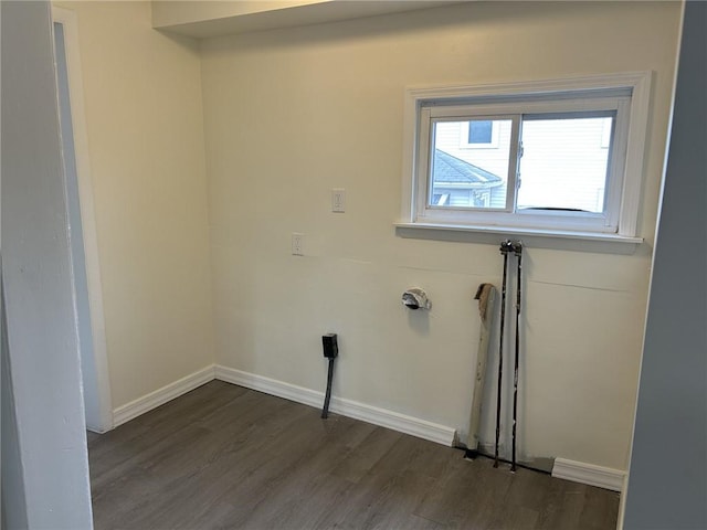 laundry room with dark hardwood / wood-style flooring