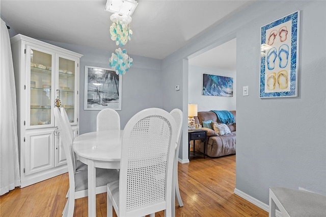 dining room featuring light hardwood / wood-style floors