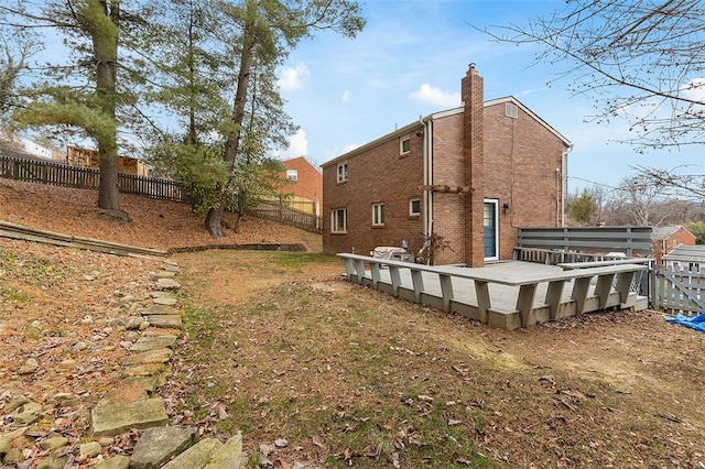 view of yard featuring a wooden deck