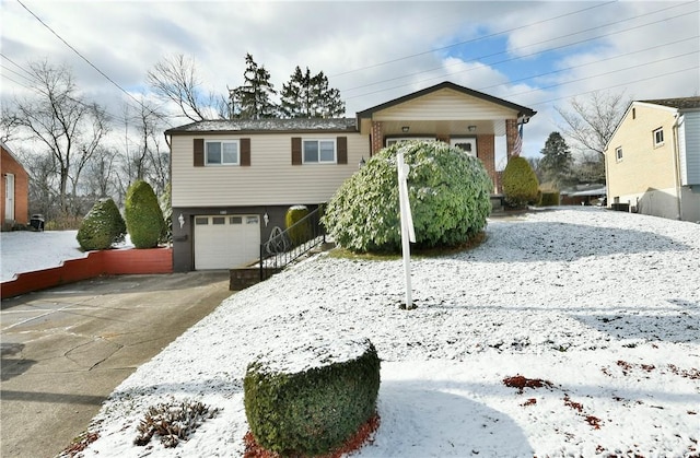 view of front of home with a garage